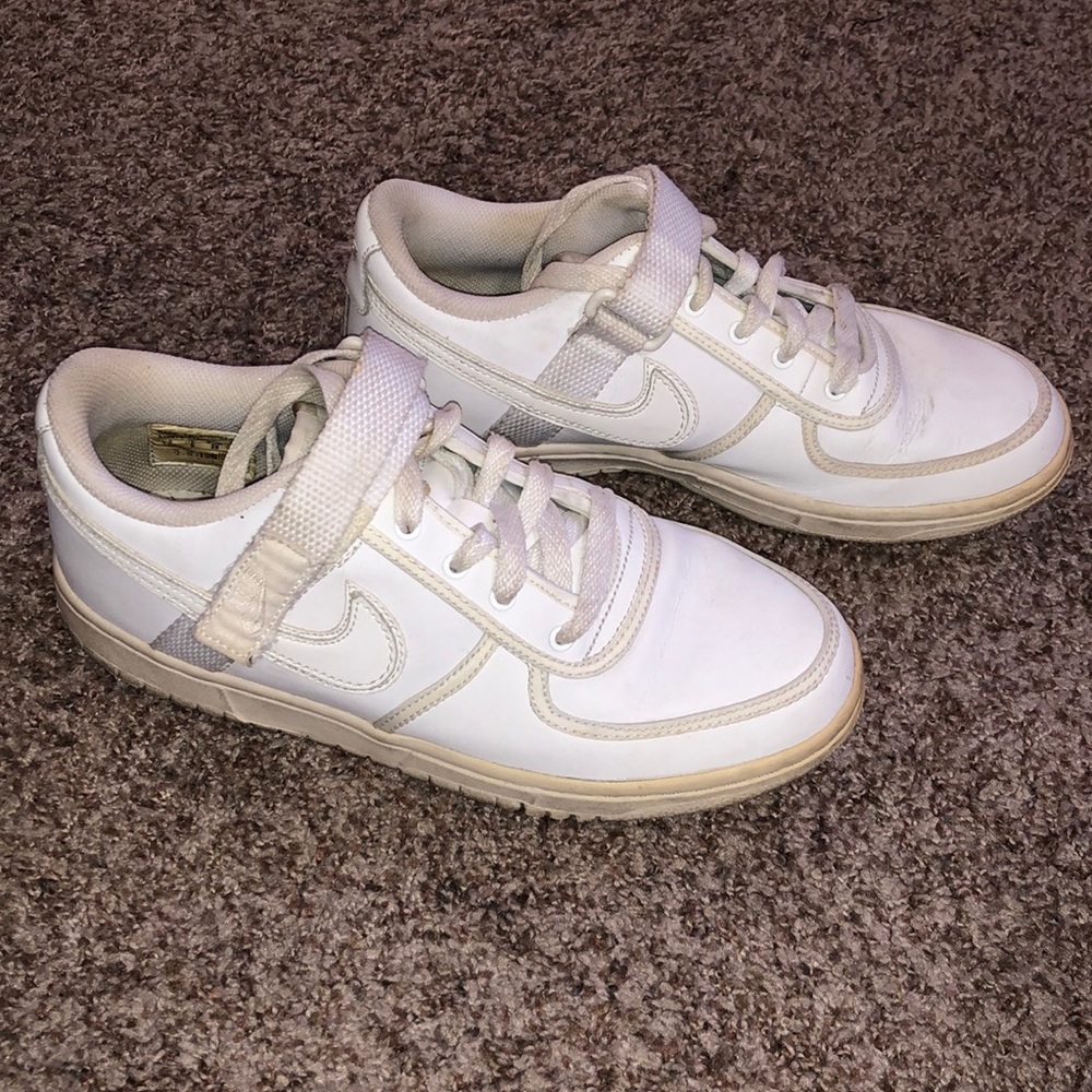 White Nike sneakers with strap